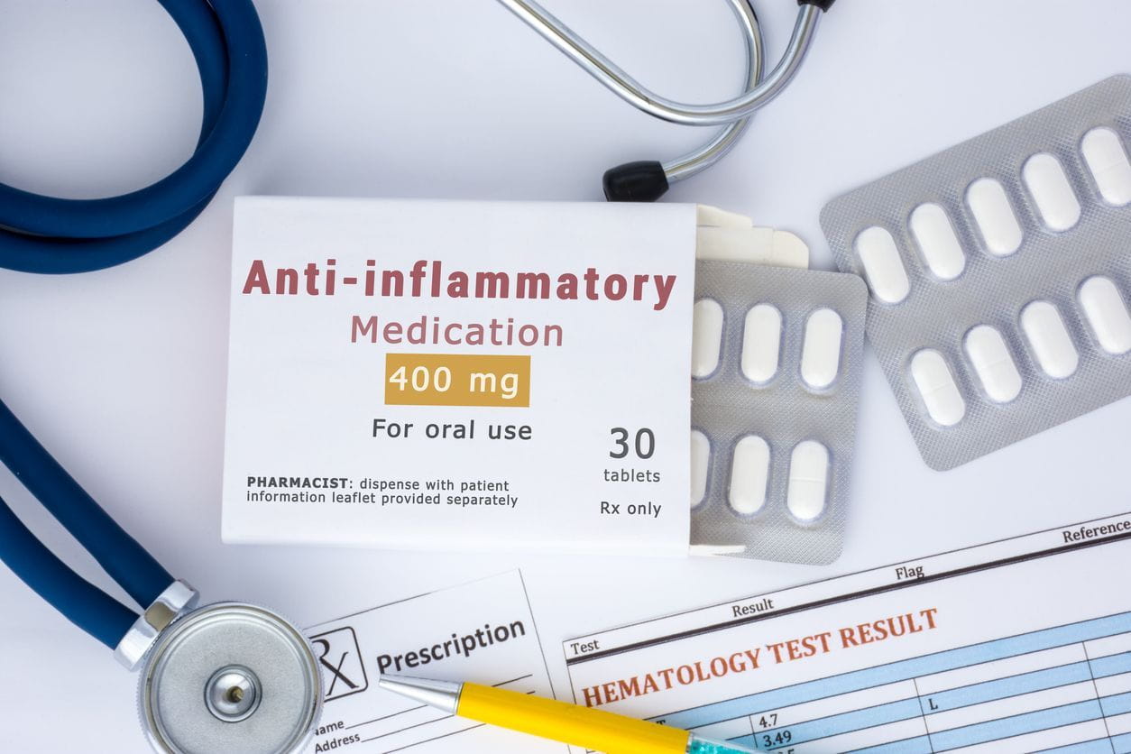 Anti-inflammatory pill on tabletop
