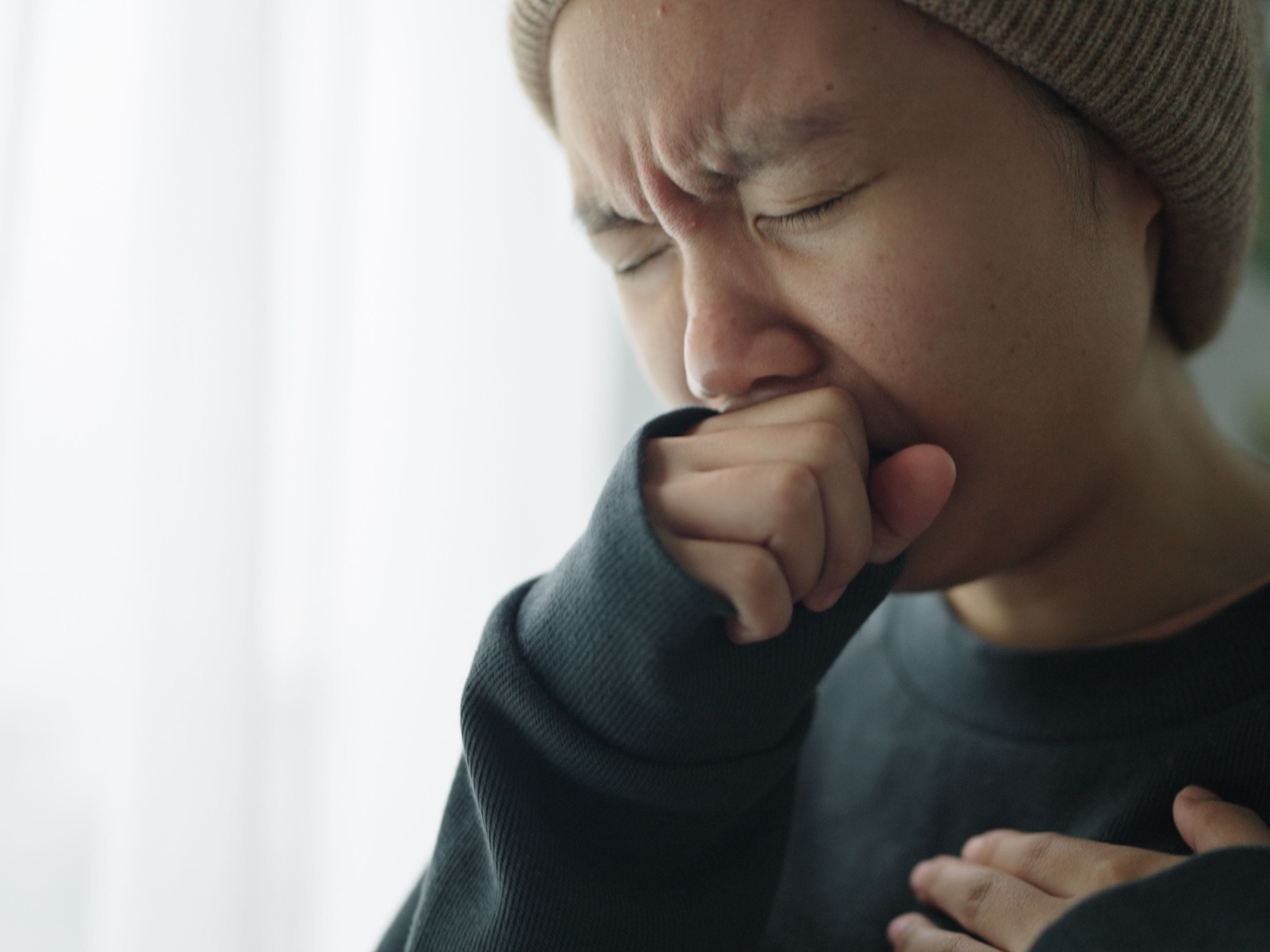 woman coughing