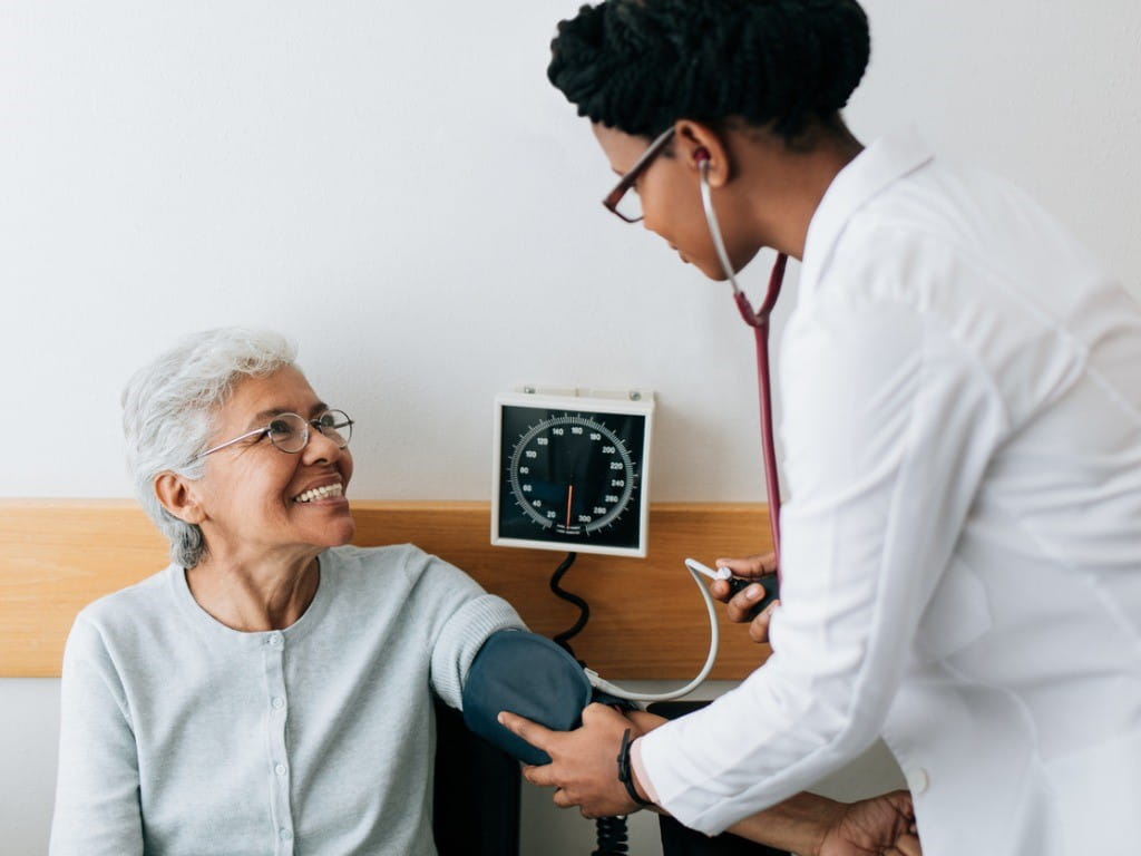 woman getting checked for high blood pressure hypertension clonidine guanfacine