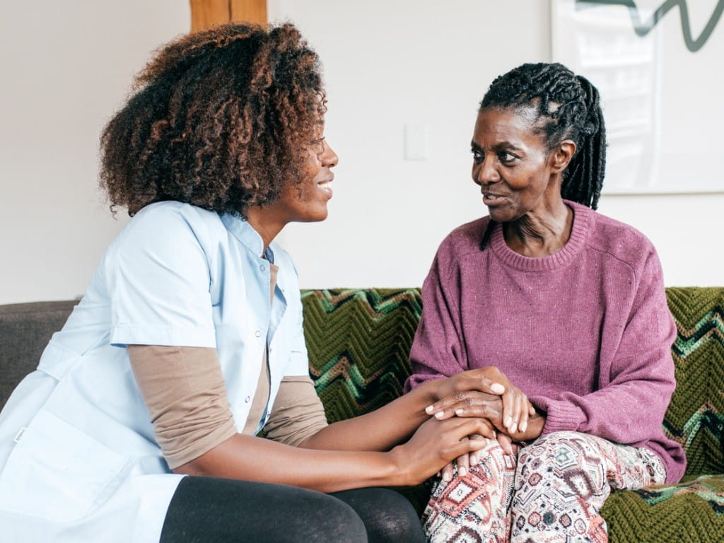 dementia patient and caregiver in retirement home