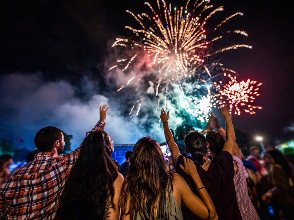 group watching fireworks