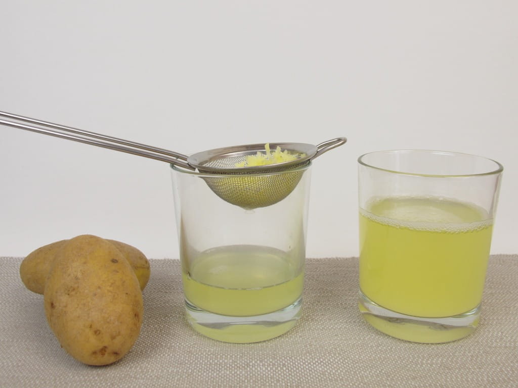 potato next to glasses of potato juice