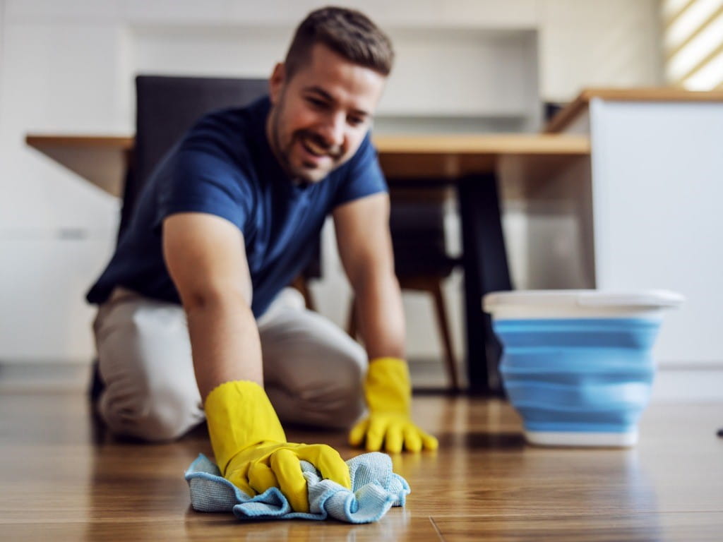 wood floor cleaners man cleaning floor